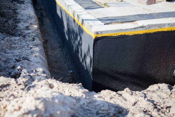 Professional Basement Waterproofing technician working in Saint Joe, IN
